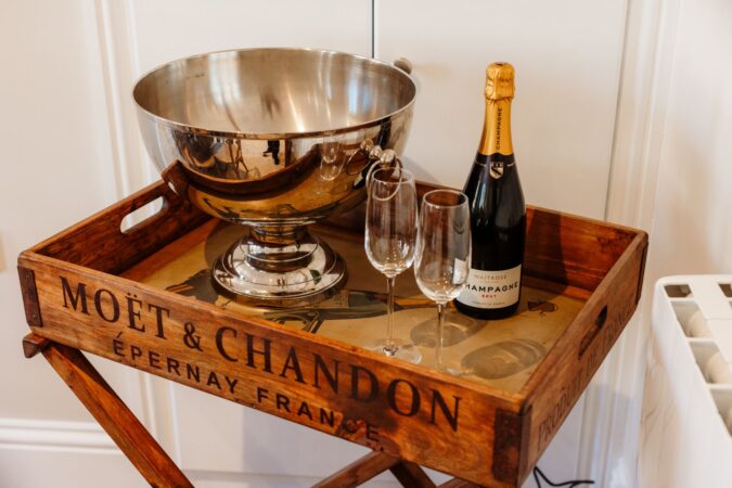 Comfortable and stylish living room with sofas and fireplace at The Hideaway cottage