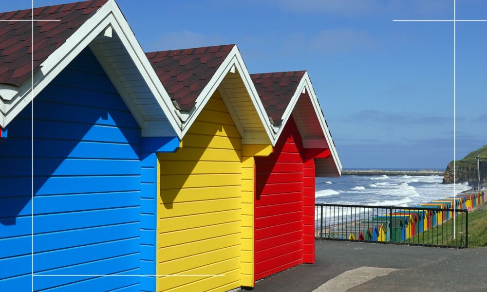 Colourful beach huts in Whitby